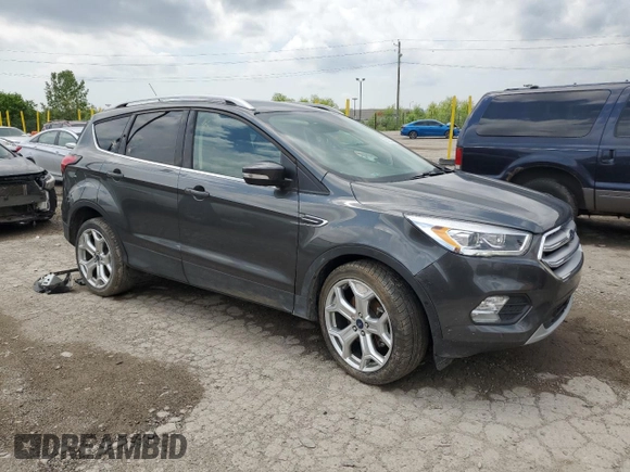 2019 Ford Escape Titanium with VIN 1FMCU0J93KUA81968, listed as a Copart auction lot 56232665 with 26,631 mi miles and Salvage title. Bid and sale history available at DreamBid. Image 4.