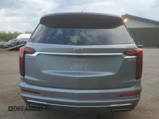 2025 Cadillac XT6 AWD Premium Luxury z VIN 1GYKPDRS8SZ118323, wystawiony jako Copart lot #56156145 z przebiegiem 12 406 mil mil oraz Tytuł czysty. Historia ofert i sprzedaży dostępna na DreamBid. Obrazek 6.