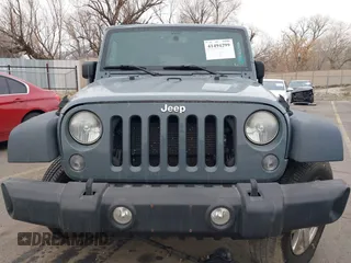 2014 Jeep Wrangler Unlimited Sport with VIN 1C4BJWDG4EL319259, listed as a IAAI auction lot 41494299 with 141,699 mi miles. Bid and sale history available at carsss.com. Image 12.