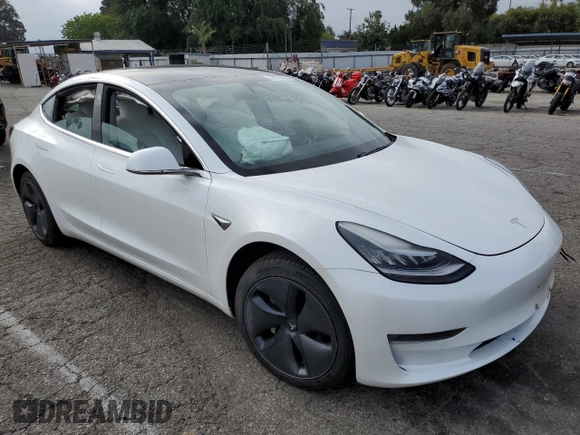 2019 Tesla Model 3 Mid Range z VIN 5YJ3E1EAXKF429382, wystawiony jako Copart lot #56172625 z przebiegiem Nie podano mil oraz Szkoda całkowita • Salvage title. Historia ofert i sprzedaży dostępna na DreamBid. Obrazek 4.