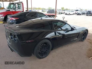 2005 Chevrolet Corvette with VIN 1G1YY24U255101774, listed as a IAAI auction lot 41964756 with 136,116 mi miles. Bid and sale history available at carsss.com. Image 4.