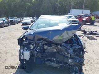 2018 Toyota Corolla L with VIN 2T1BURHE5JC044441, listed as a IAAI auction lot 42244017 with Not provided miles and . Bid and sale history available at DreamBid. Image 13.