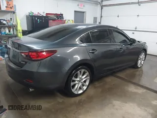 2016 Mazda Mazda6 i Touring with VIN JM1GJ1V53G1481551, listed as a IAAI auction lot 41525760 with 89,880 mi miles. Bid and sale history available at carsss.com. Image 4.