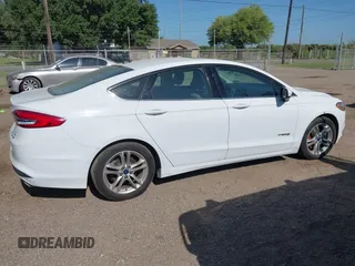 2018 Ford Fusion SE z VIN 3FA6P0LU2JR155483, wystawiony jako IAAI lot #42019475 z przebiegiem Nie podano mil oraz . Historia ofert i sprzedaży dostępna na DreamBid. Obrazek 13.