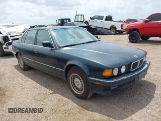 1994 BMW 7 Series with VIN WBAGD8329RDE92628, listed as a IAAI auction lot 42177332 with 176,179 mi miles and . Bid and sale history available at DreamBid. Image 1.