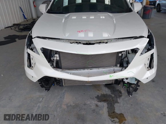 2019 Cadillac XT4 FWD Premium Luxury z VIN 1GYFZCR49KF142039, wystawiony jako IAAI lot #42259448 z przebiegiem 47 620 mil mil oraz . Historia ofert i sprzedaży dostępna na DreamBid. Obrazek 6.