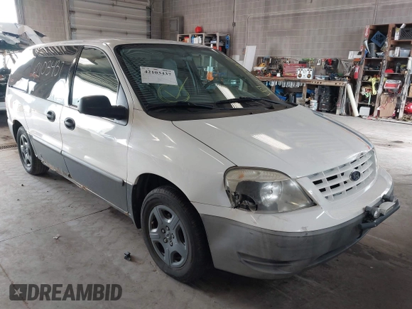 2006 Ford Freestar Cargo with VIN 2FTZA54666BA14556, listed as a IAAI auction lot 42103437 with 147,998 mi miles. Bid and sale history available at carsss.com. Image 6.