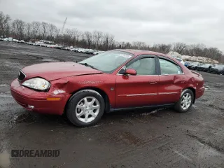2000 Mercury Sable LS Premium with VIN 1MEFM55S7YA617342, listed as a Copart auction lot 85764394 with 71,628 mi miles and Salvage Title. Bid and sale history available at carsss.com. Image 1.