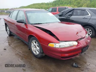 2001 Oldsmobile Intrigue GX z VIN 1G3WH52H41F219545, wystawiony jako IAAI lot #42191553 z przebiegiem 105 998 mil mil oraz . Historia ofert i sprzedaży dostępna na DreamBid. Obrazek 1.