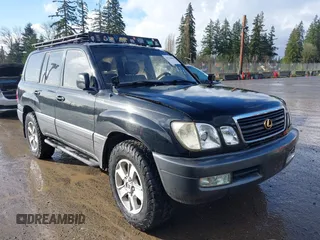 2001 Lexus LX 470 with VIN JTJHT00W613500563, listed as a IAAI auction lot 41730804 with 232,647 mi miles and . Bid and sale history available at carsss.com. Image 1.