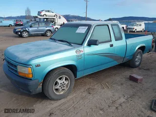 1995 Dodge Dakota with VIN 1B7GL23X3SW916018, listed as a IAAI auction lot 41722690 with 128,385 mi miles. Bid and sale history available at carsss.com. Image 2.