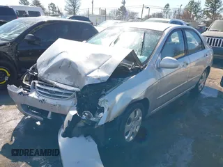 2006 Kia Spectra EX with VIN KNAFE121865313085, listed as a IAAI auction lot 41672712 with 248,959 mi miles. Bid and sale history available at carsss.com. Image 6.