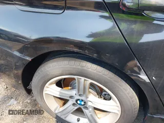 2014 BMW 3 Series 320i with VIN WBA3B1C56EK131849, listed as a IAAI auction lot 42018005 with 215,765 mi miles. Bid and sale history available at carsss.com. Image 12.