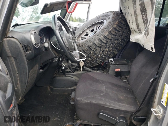 2013 Jeep Wrangler Unlimited Sport с VIN 1C4BJWDG1DL635698, выставлен на аукционе Copart как лот 57111835 с пробегом 185 759 миль миль и Списание • Salvage title. История ставок и продаж доступна на DreamBid. Изображение 7.