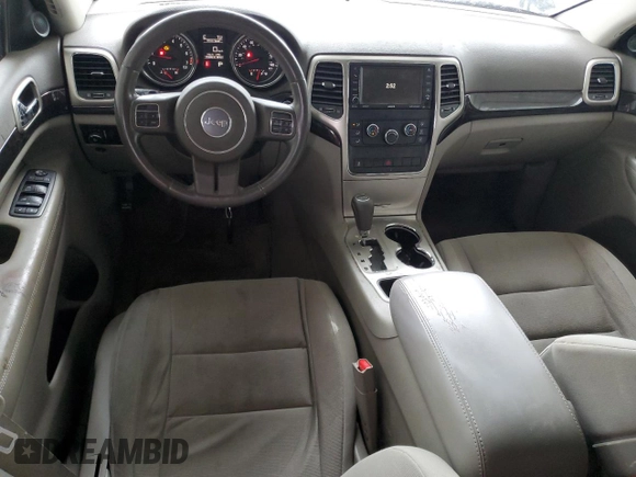 2012 Jeep Grand Cherokee Laredo with VIN 1C4RJEAG1CC316703, listed as a Copart auction lot 52128105 with 203,896 mi miles and Salvage Title. Bid and sale history available at carsss.com. Image 8.