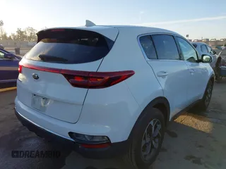2020 Kia Sportage LX with VIN KNDPM3AC2L7733689, listed as a IAAI auction lot 41858043 with 93,979 mi miles and . Bid and sale history available at DreamBid. Image 4.