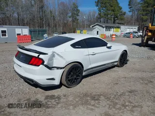 2019 Ford Mustang EcoBoost with VIN 1FA6P8TH7K5200827, listed as a IAAI auction lot 41652020 with 57,053 mi miles and . Bid and sale history available at carsss.com. Image 4.