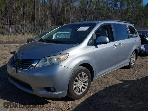 2011 Toyota Sienna XLE AAS with VIN 5TDYK3DC5BS039959, listed as a IAAI auction lot 41803881 with 129,479 mi miles. Bid and sale history available at carsss.com. Image 23.