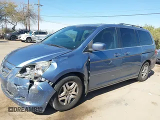 2006 Honda Odyssey EX-L with VIN 5FNRL38796B099851, listed as a IAAI auction lot 41555109 with 154,707 mi miles and . Bid and sale history available at DreamBid. Image 6.