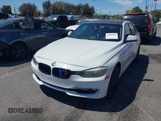 2012 BMW 3 Series 328i with VIN WBA3A5C50CF342206, listed as a IAAI auction lot 42008940 with 130,164 mi miles. Bid and sale history available at carsss.com. Image 2.