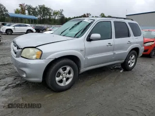 2006 Mazda Tribute i with VIN 4F2YZ02Z26KM14821, listed as a Copart auction lot 71718434 with 318,841 mi miles and Salvage Title. Bid and sale history available at carsss.com. Image 1.
