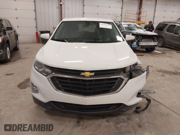 2018 Chevrolet Equinox LT z VIN 2GNAXSEV7J6138909, wystawiony jako IAAI lot #41295974 z przebiegiem 68 852 mil mil oraz . Historia ofert i sprzedaży dostępna na DreamBid. Obrazek 12.