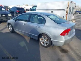 2007 Honda Civic Sdn EX with VIN 1HGFA16807L069520, listed as a IAAI auction lot 41957002 with 135,990 mi miles. Bid and sale history available at carsss.com. Image 3.