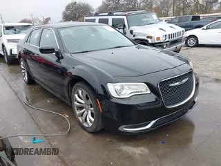 2019 Chrysler 300 Touring with VIN 2C3CCAAG1KH542524, listed as a IAAI auction lot 41091359 with 74,559 mi miles and . Bid and sale history available at DreamBid. Image 1.