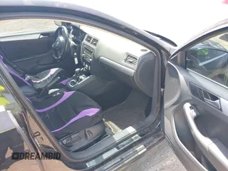 2013 Volkswagen Jetta SE z VIN 3VWDP7AJ7DM311471, wystawiony jako IAAI lot #42574345 z przebiegiem 81 760 mil mil oraz . Historia ofert i sprzedaży dostępna na DreamBid. Obrazek 5.