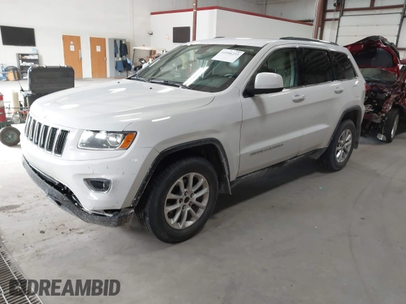 2014 Jeep Grand Cherokee Laredo with VIN 1C4RJFAG4EC309401, listed as a IAAI auction lot 41996233 with 243,541 mi miles and . Bid and sale history available at DreamBid. Image 17.