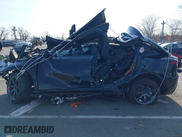 2024 Tesla Model Y Long Range with VIN 7SAYGDEE4RF149894, listed as a IAAI auction lot 41771185 with Not Provided miles and . Bid and sale history available at DreamBid. Image 13.