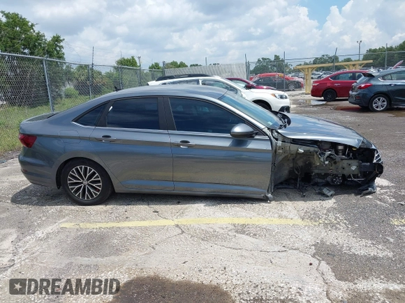 2021 Volkswagen Jetta S z VIN 3VWC57BU4MM009727, wystawiony jako IAAI lot #42339309 z przebiegiem 52 395 mil mil oraz . Historia ofert i sprzedaży dostępna na DreamBid. Obrazek 14.
