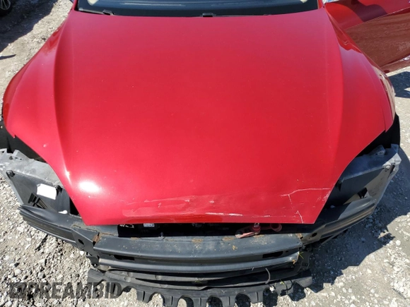 2014 Tesla Model S 60 with VIN 5YJSA1S12EFP65799, listed as a Copart auction lot 50895235 with 132,669 mi miles and Salvage Title. Bid and sale history available at DreamBid. Image 11.