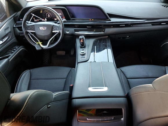 2021 Cadillac Escalade z VIN 1GYS3PKL6MR288828, wystawiony jako Copart lot #78219414 z przebiegiem 22 362 mil mil oraz Czysty tytuł • Clean title. Historia ofert i sprzedaży dostępna na DreamBid. Obrazek 8.