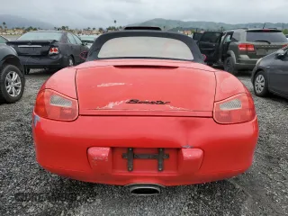 1999 Porsche Boxster z VIN WP0CA2981XU625007, wystawiony jako Copart lot #53751295 z przebiegiem 93 384 mil mil oraz Czysty tytuł • Clean title. Historia ofert i sprzedaży dostępna na DreamBid. Obrazek 6.