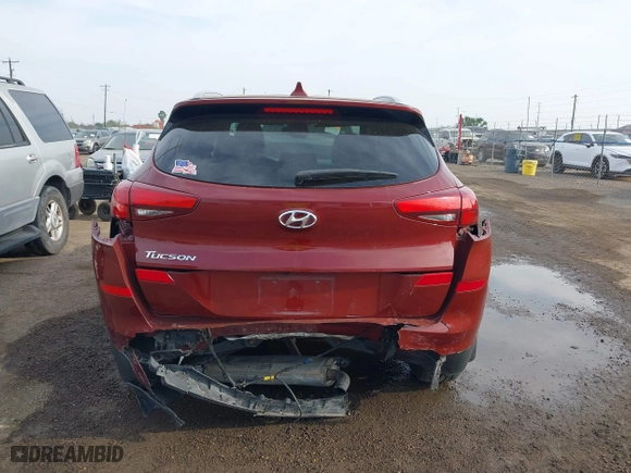 2019 Hyundai Tucson Value with VIN KM8J33A42KU861329, listed as a IAAI auction lot 41679185 with 65,304 mi miles. Bid and sale history available at carsss.com. Image 16.