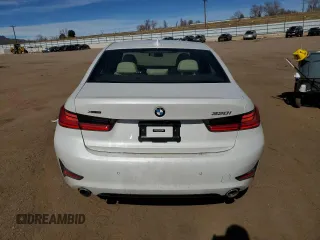 2021 BMW 3 Series 330i xDrive with VIN WBA5R7C01MFK13622, listed as a Copart auction lot 46520295 with 58,260 mi miles and Salvage title. Bid and sale history available at DreamBid. Image 6.