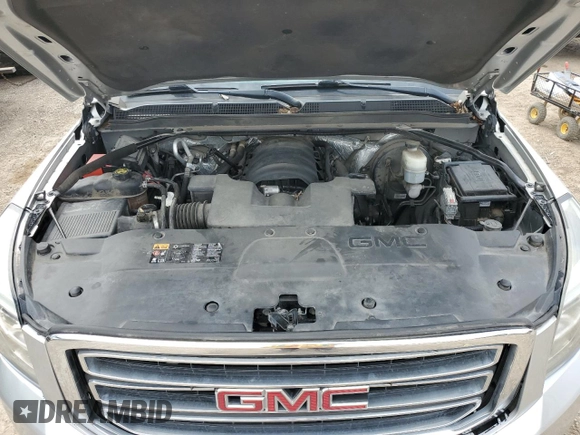 2015 GMC Yukon SLT with VIN 1GKS1BKC2FR661854, listed as a Copart auction lot 48418105 with 169,970 mi miles and Salvage Title. Bid and sale history available at carsss.com. Image 11.