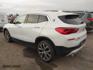 2020 BMW X2 sDrive28i with VIN WBXYH9C02L5R10335, listed as a IAAI auction lot 40651317 with 67,897 mi miles. Bid and sale history available at carsss.com. Image 3.