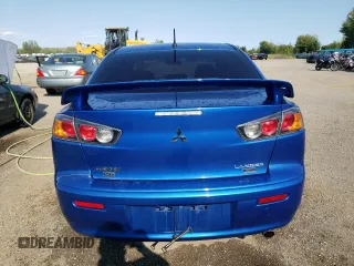 2015 Mitsubishi Lancer SE with VIN JA32V2FW3FU606202, listed as a Copart auction lot 70142394 with 129,336 mi miles and Salvage Title. Bid and sale history available at carsss.com. Image 6.