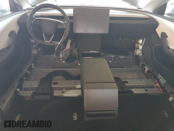 2025 Tesla Model 3 Long Range z VIN 5YJ3E1EB6SF935588, wystawiony jako Copart lot #54360605 z przebiegiem Nie podano mil oraz Szkoda całkowita • Salvage title. Historia ofert i sprzedaży dostępna na DreamBid. Obrazek 8.