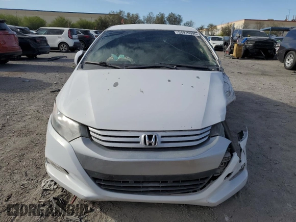 2010 Honda Insight EX z VIN JHMZE2H75AS007066, wystawiony jako Copart lot #54910995 z przebiegiem 107 658 mil mil oraz Szkoda całkowita • Salvage title. Historia ofert i sprzedaży dostępna na DreamBid. Obrazek 5.
