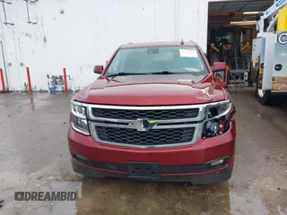 2020 Chevrolet Suburban LT with VIN 1GNSKHKC9LR233603, listed as a IAAI auction lot 41311582 with 104,754 mi miles. Bid and sale history available at carsss.com. Image 12.