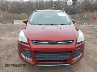 2014 Ford Escape SE with VIN 1FMCU0G99EUC38074, listed as a IAAI auction lot 42001227 with 209,467 mi miles. Bid and sale history available at carsss.com. Image 6.