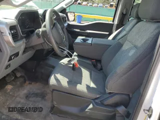 2023 Ford F-150 XL with VIN 1FTFW1E89PKD98613, listed as a Copart auction lot 61860785 with 25,568 mi miles and Salvage title. Bid and sale history available at DreamBid. Image 7.