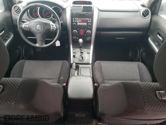2008 Suzuki Grand Vitara w/Spare & Cargo Covers с VIN JS3TD941884102404, выставлен на аукционе Copart как лот 86215464 с пробегом 116 173 миль миль и Списание • Salvage title. История ставок и продаж доступна на DreamBid. Изображение 8.