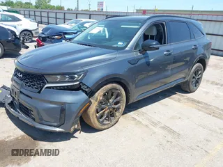 2023 Kia Sorento SX z VIN 5XYRK4LF3PG242259, wystawiony jako IAAI lot #41970398 z przebiegiem 31 293 mil mil oraz . Historia ofert i sprzedaży dostępna na DreamBid. Obrazek 2.