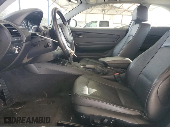 2013 BMW 1 Series 128i with VIN WBAUP7C51DVP24864, listed as a Copart auction lot 86905314 with 136,975 mi miles and Salvage Title. Bid and sale history available at carsss.com. Image 7.