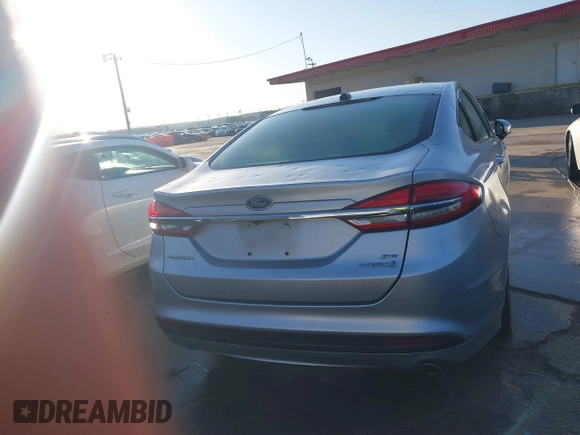 2018 Ford Fusion Hybrid SE with VIN 3FA6P0LU9JR162611, listed as a IAAI auction lot 41760137 with 62,658 mi miles. Bid and sale history available at carsss.com. Image 16.