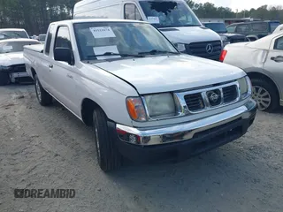 1999 Nissan Frontier XE z VIN 1N6DD26SXXC324508, wystawiony jako IAAI lot #41521674 z przebiegiem 297 239 mil mil oraz . Historia ofert i sprzedaży dostępna na DreamBid. Obrazek 1.